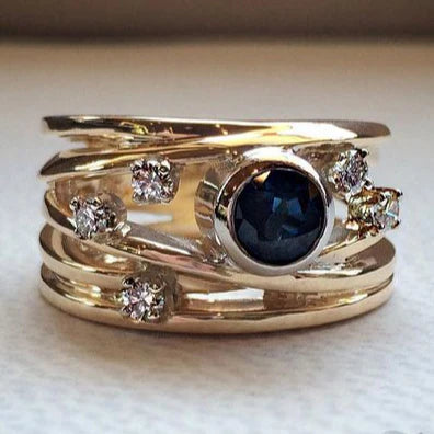 Anillo con Cristales Azules Incrustados Multicapa