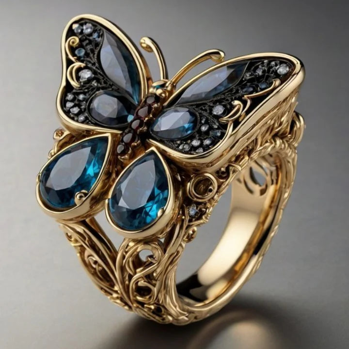 Anillo Exótico Mariposa Cristal Azul en Oro